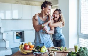 healthy young couple eating