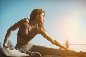 Woman Outside Stretching